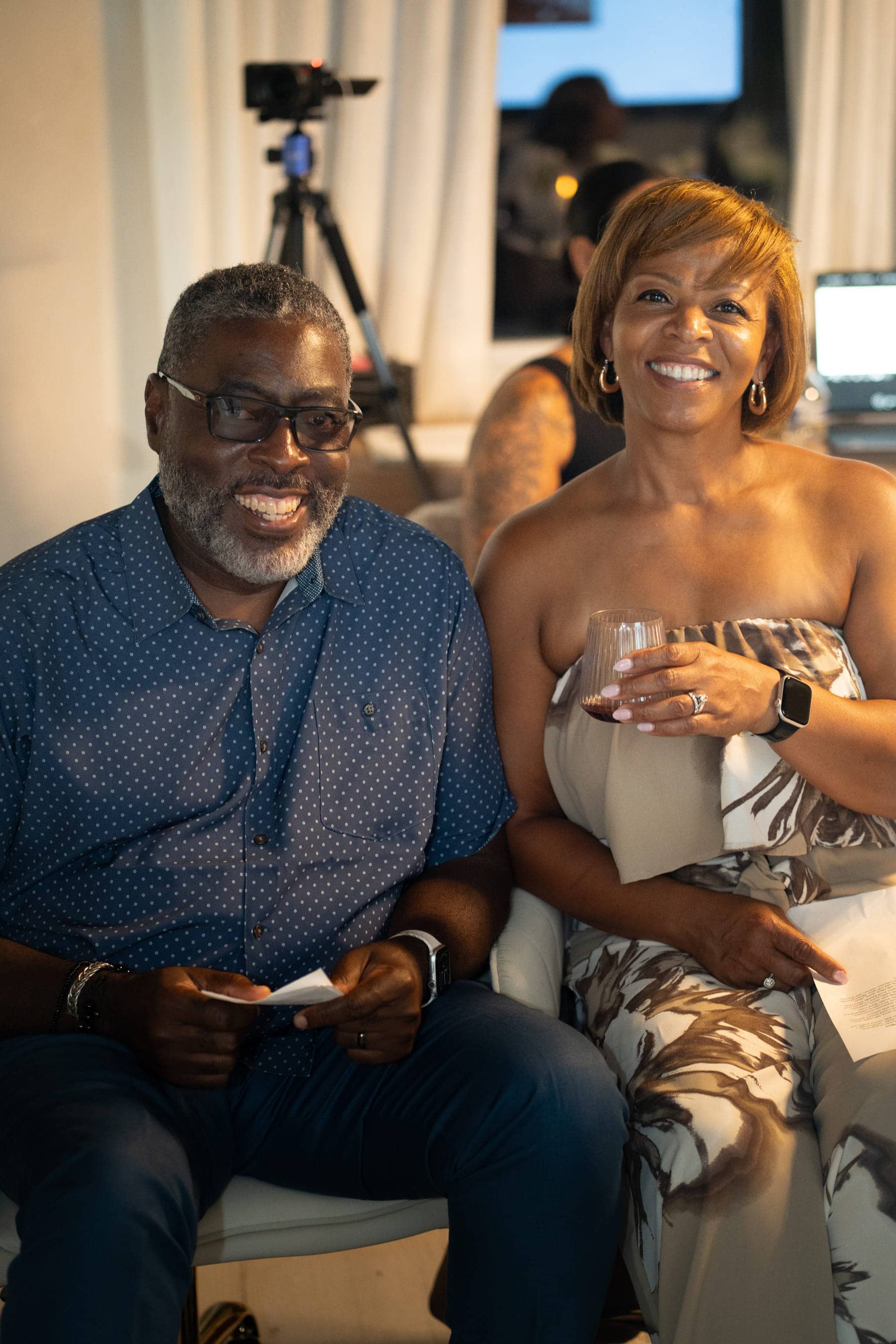 Two guests smiling together at a Molina Mortgage client and partner event